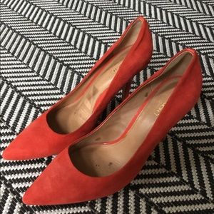 Red suede Coach heels